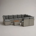 Set salotto da giardino modulare a U 8 pezzi, 7 posti, in rattan PE grigio con cuscini e tavolino, 300 x 205 x 64 cm